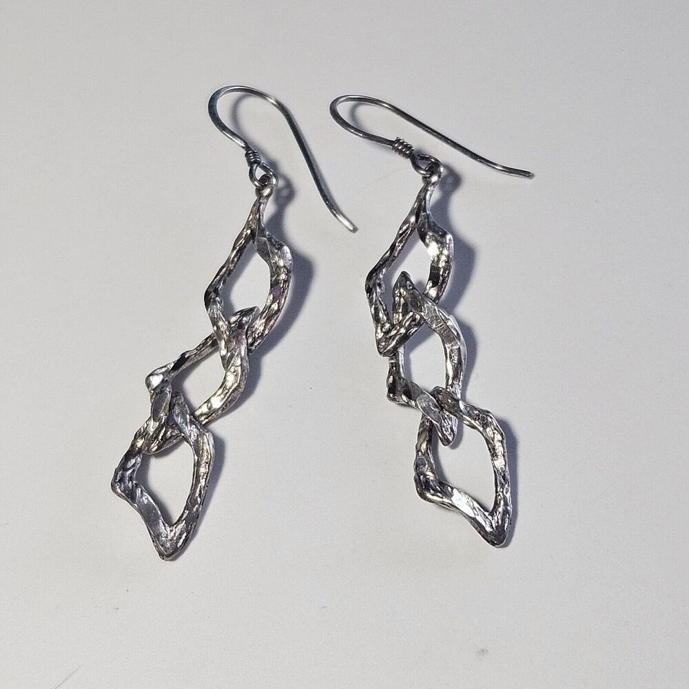 MJ Sterling Silver Dangling Earrings